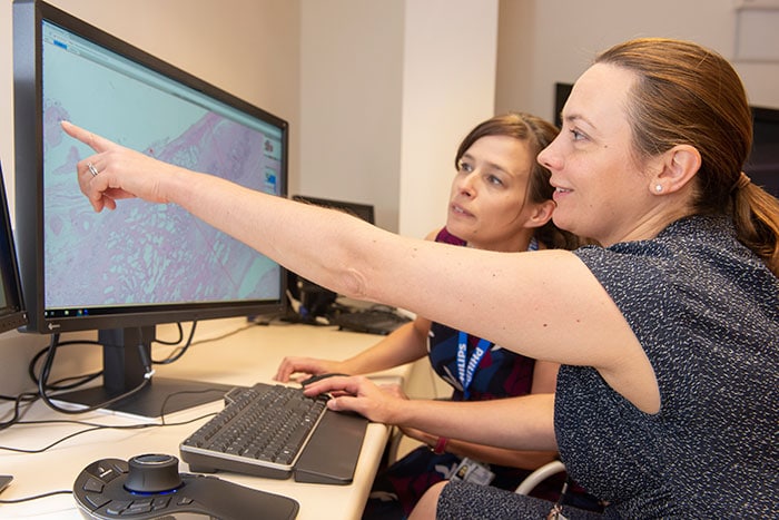 Download image (.jpg) Dr Lisa Browning and Professor Clare Verrill, Honorary Consultant in Cellular Pathology at Oxford University Hospitals working with Philips IntelliSite Pathology Solutions Image Management System (opens in a new window)